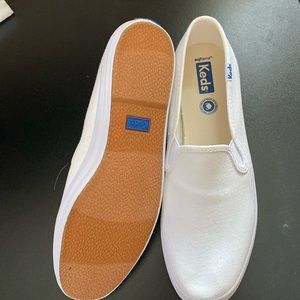 NWOT women’s white canvas Keds slip on shoes size 9